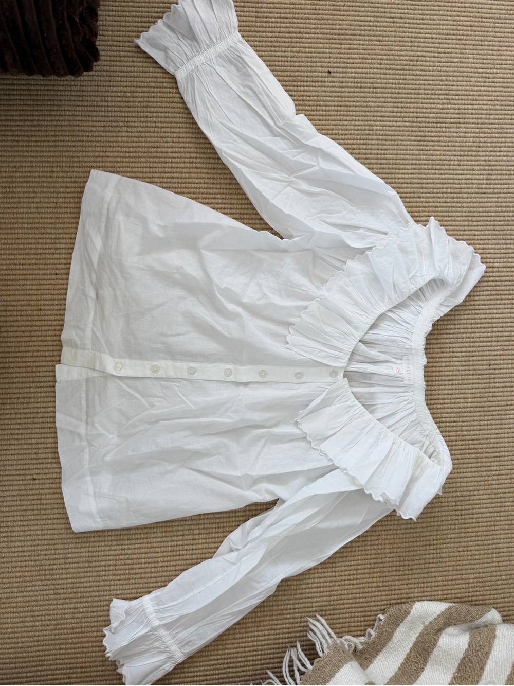 White ruffle blouse